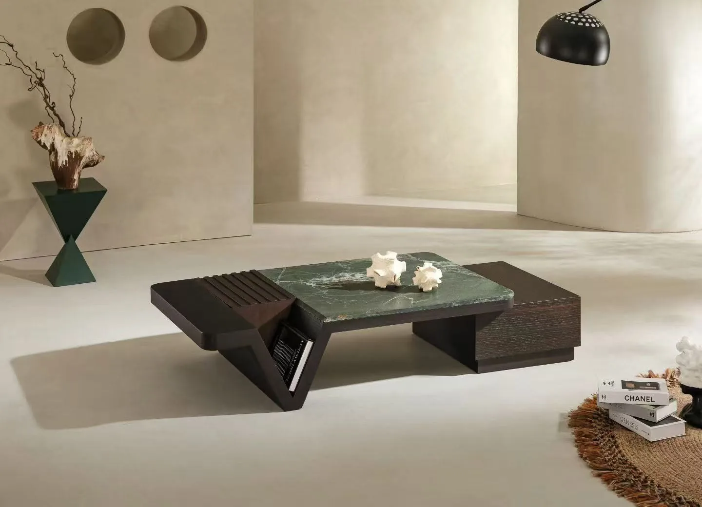 Sculptural coffee table with a green surface and contrasting dark elements